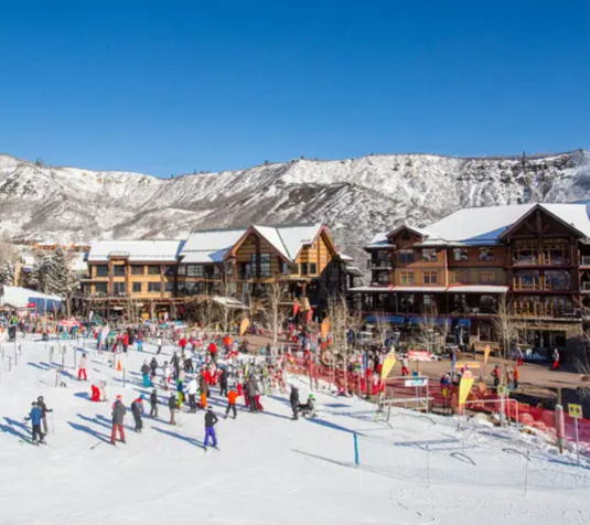 Ski village and snow-covered slopes at Aspen Snowmass